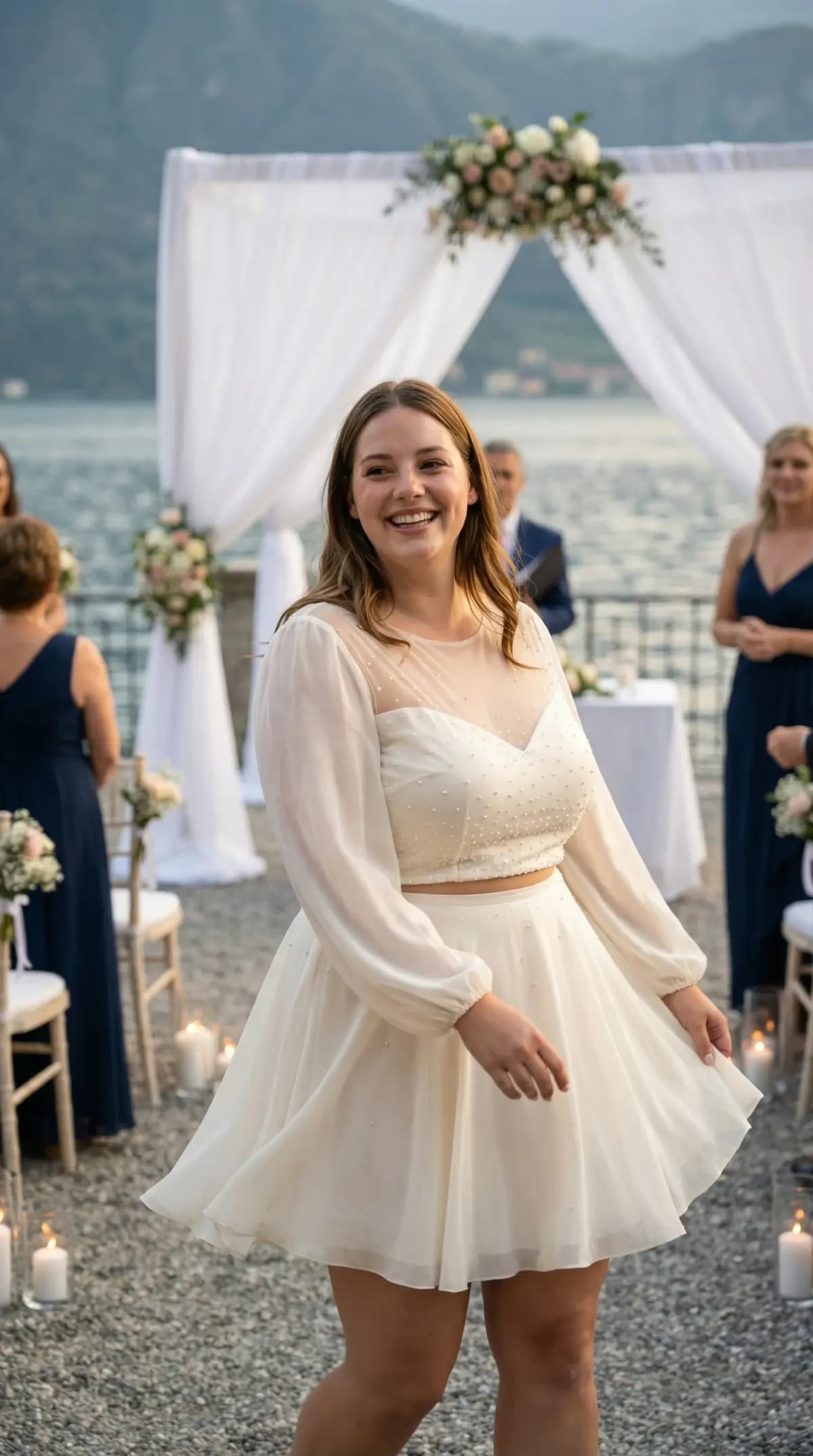 White two-piece crop top and mini skirt at lakeside venue