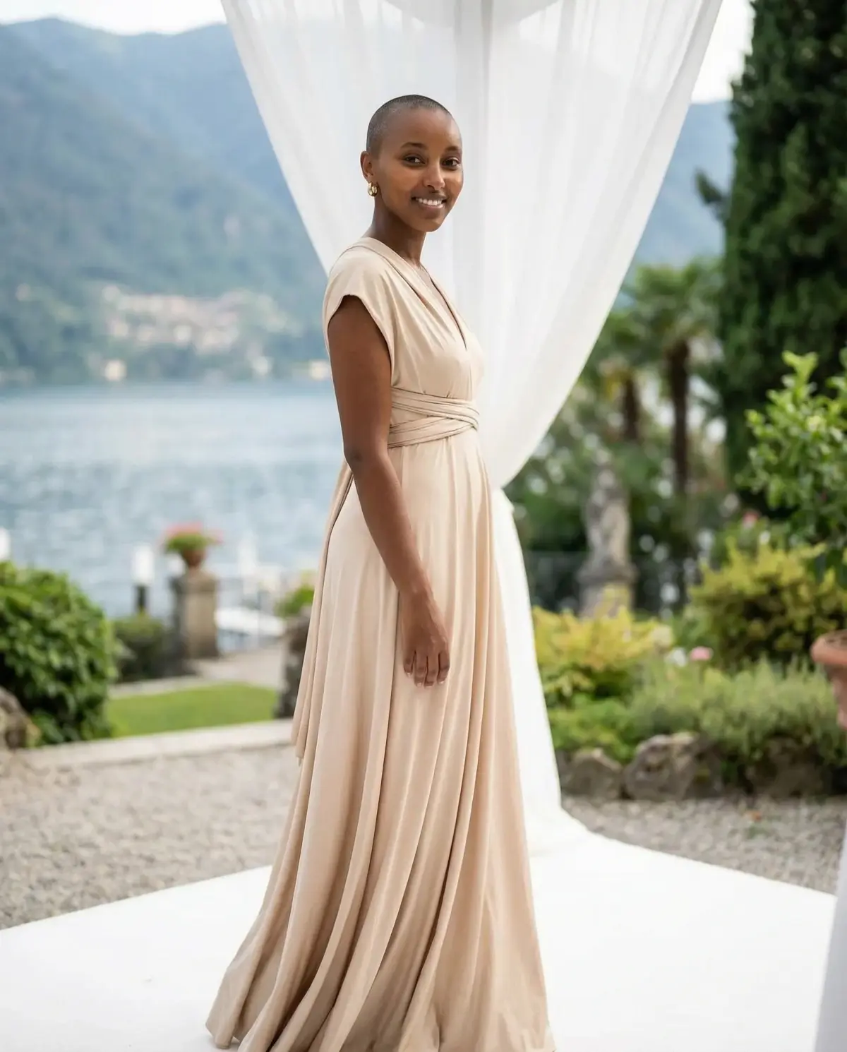 Champagne convertible bridesmaid dress styled with cap-sleeve wrap