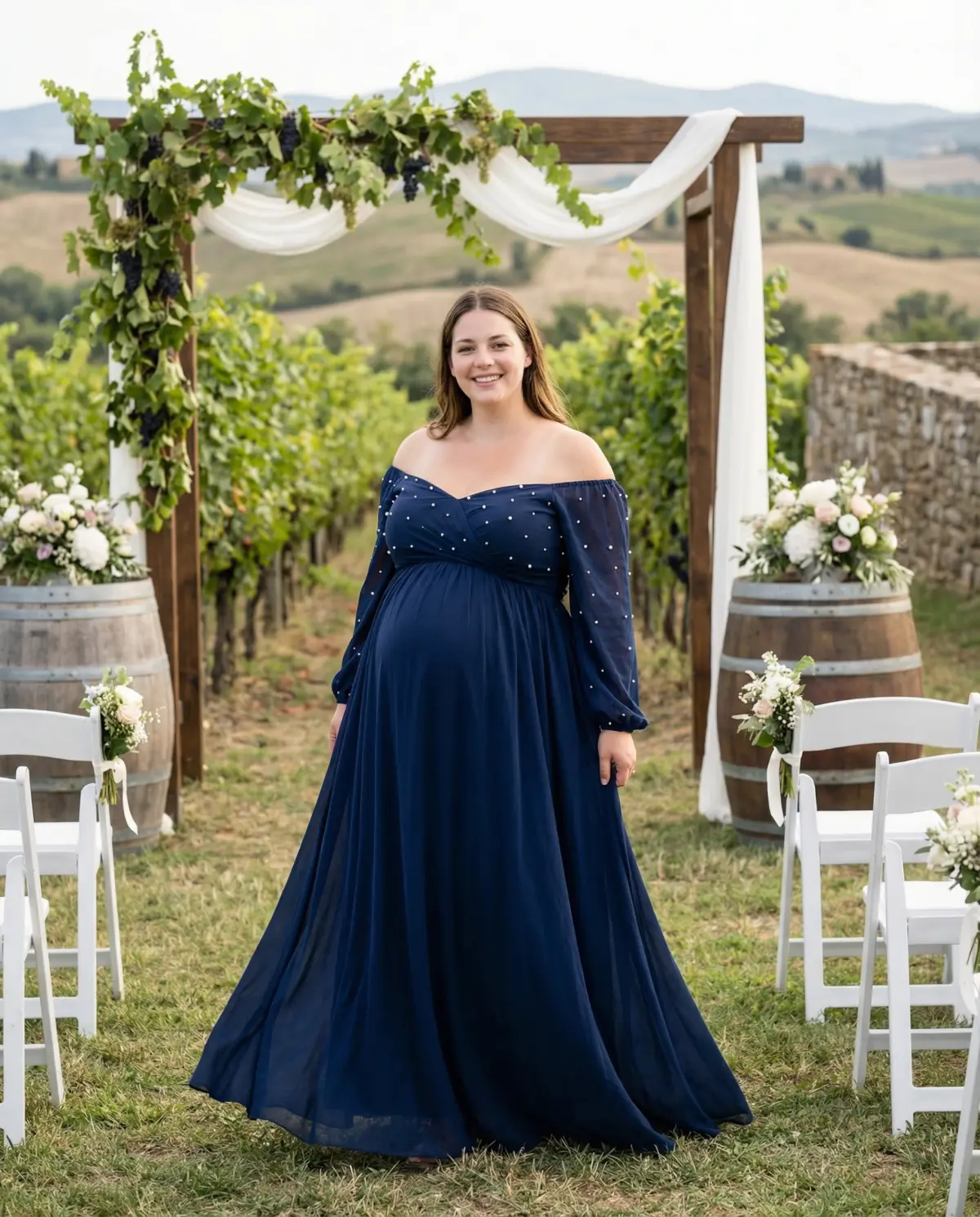 Navy empire waist gown offering comfortable style for maternity wedding guests